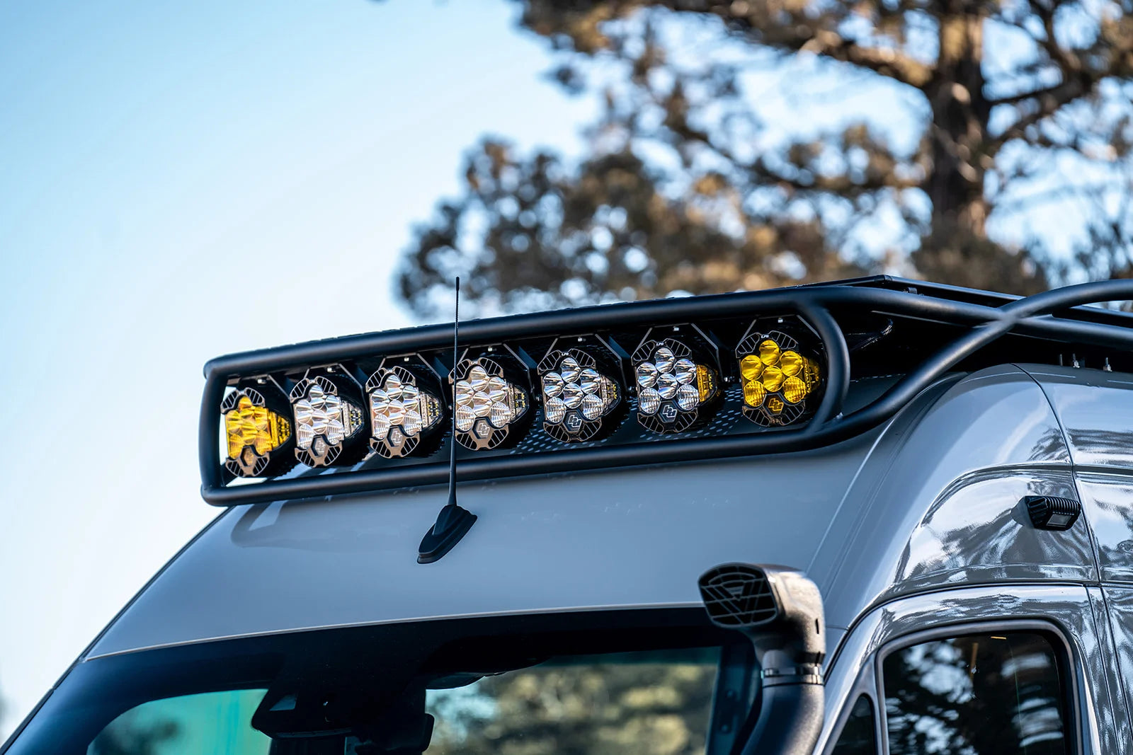 Seven Baja Designs LP6 lights in a Paragon Safari rack on a Sprinter