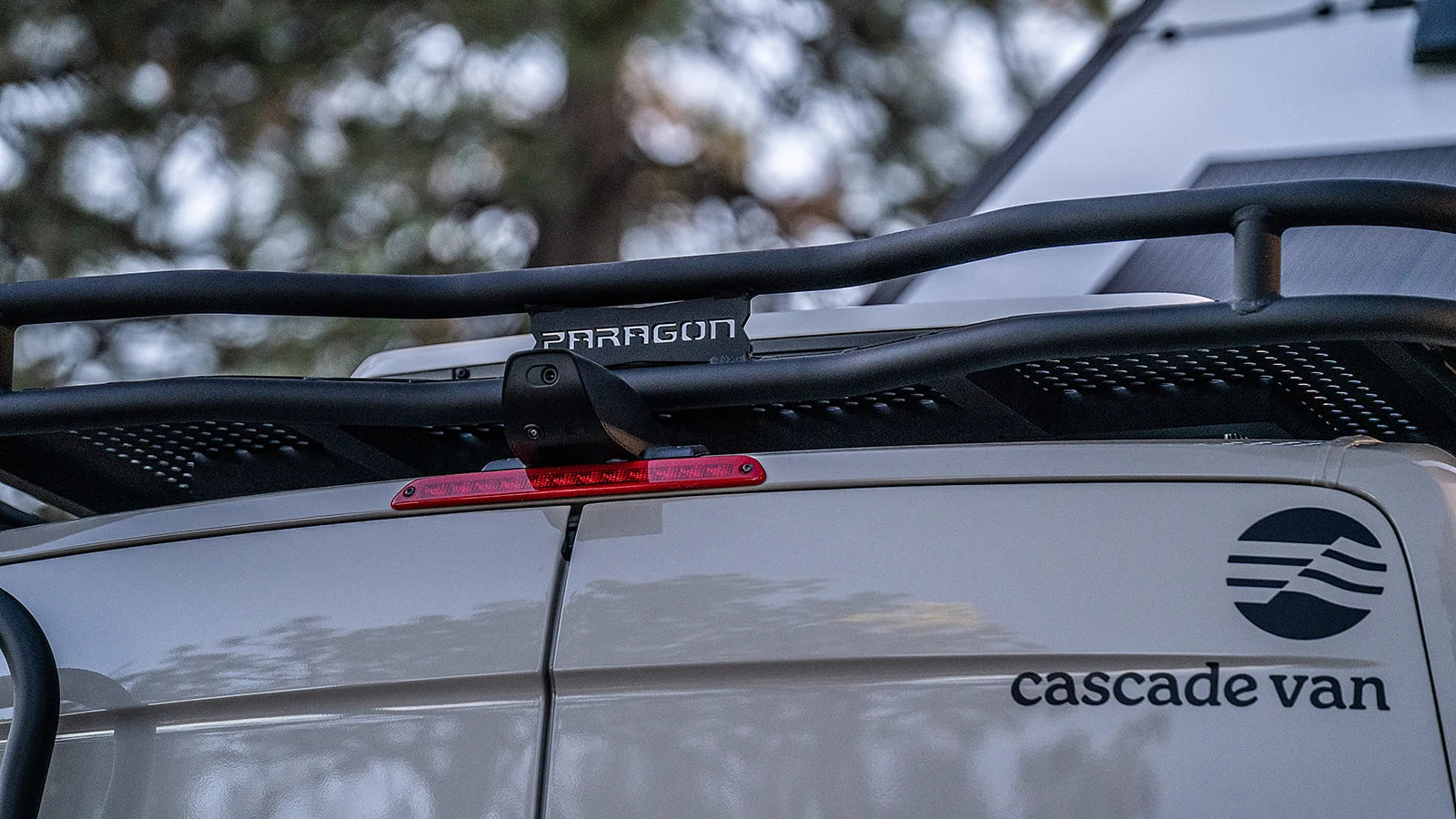 Paragon badge on a roof rack fitted to a Cascade Van Sprinter
